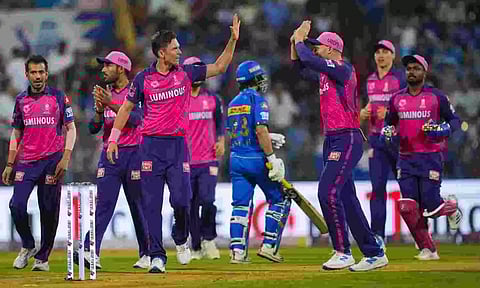RR players celebrate after a wicket (PTI)