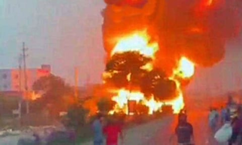 Vehicles caught fire after an oil tanker overturned on the Dhaka-Aricha highway (IANS)