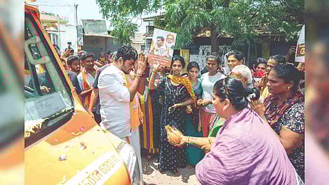 Women welcoming BJP state president K Annamalai while campaigning in Coimbatore on Tuesday