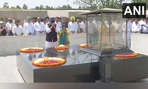 Sanjay Singh at Rajghat with wife Anita Singh (ANI)