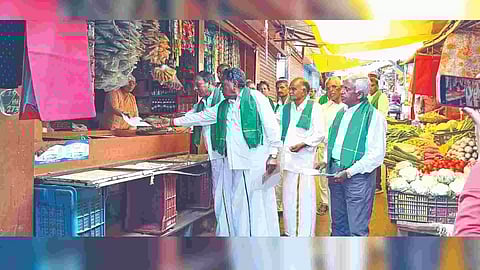 Farmers distribute pamphlets seeking people to boycott LS polls recently