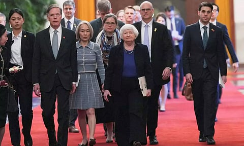 U.S. Treasury Secretary Janet Yellen walks with U.S. ambassador to China Nicholas Burns to attend a meeting with Chinese Premier Li Qiang