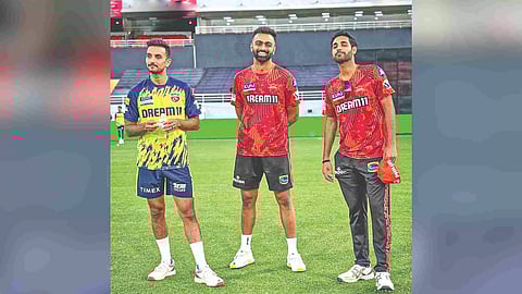 Punjab’s Harshal Patel with Sunrisers’s Jaydev Unadkat and Bhuvneshwar Kumar