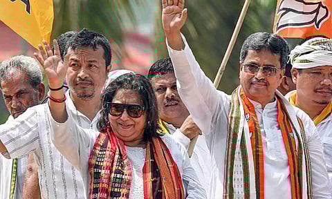 Tripura Chief Minister Manik Saha with candidate from East Tripura Kriti Singh Debbarma (PTI)