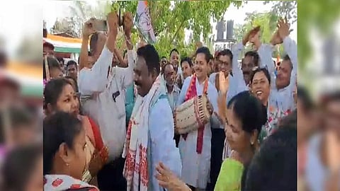 Assam Congress Chief plays Dhol and its Sonitpur LS candidate dances (Photo/ANI)