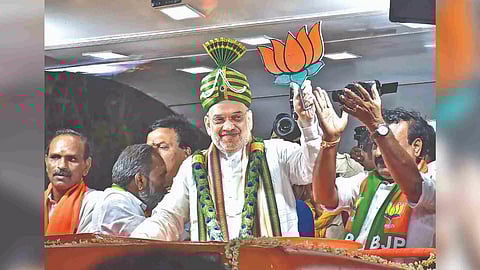 Union Home Minister Amit Shah during the roadshow in Madurai on Friday