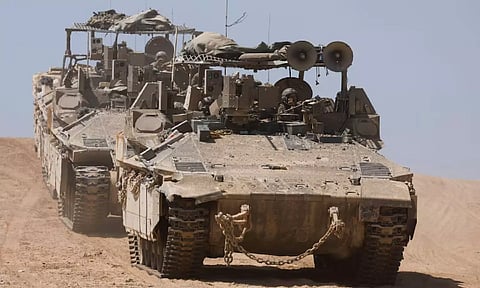 Israeli armoured personnel carriers (APC) manoeuvre, near the Israel-Gaza border, amid the ongoing conflict between Israel and the Palestinian Islamist group Hamas