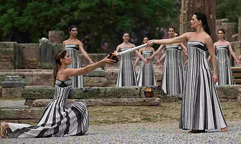 Greek actress Mary Mina, playing the role of High Priestess, carries the torch during the Olympic Flame lighting ceremony for the Paris 2024 Olympics.&nbsp;