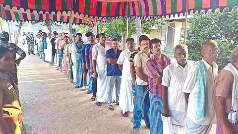 People turn up with enthusiasm to cast their vote at a polling station in Mettupalayam on Friday