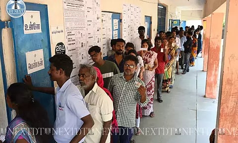 Voters wait to cast their votes (Image credits: Justin George)