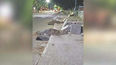 Concrete blocks placed on the footpath hindering pedestrians
