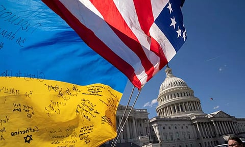 Flags flutter as pro-Ukrainian supporters demonstrate outside the U.S. Capitol
