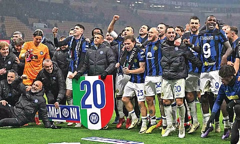 Inter Milan players celebrate after clinching the Scudetto