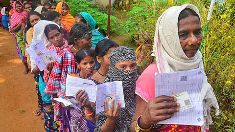 Photo of voters standing in a line for polling (PTI)