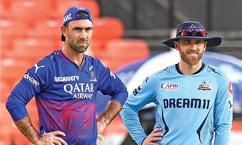 RCB’s Glenn Maxwell and Gujarat Titans’ Kane Williamson during a practice session