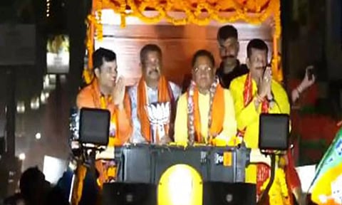 BJP candidate Dharmendra Pradhan during a roadshow (ANI)