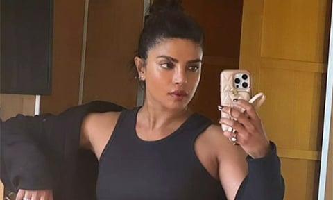 Priyanka Chopra flaunts her toned- muscles in 'between shots selfie' from the Heads of State set