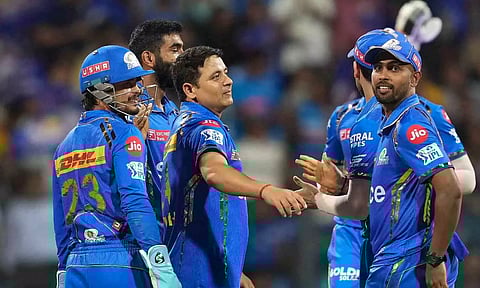 Piyush Chawla celebrates after a wicket (PTI)