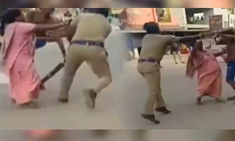 Drunken youth and cop exchange blows in Chennai (Screengrab)