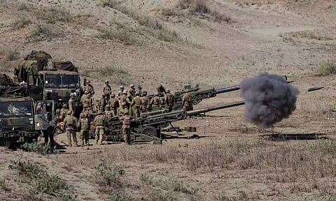 U.S. soldiers fire 155mm and 105mm Howitzers during a live fire exercise in the annual joint military exercises between U.S. and Philippine (Reuters)