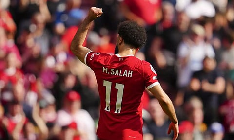 Liverpool's Mohamed Salah celebrates after scoring a goal (AP)