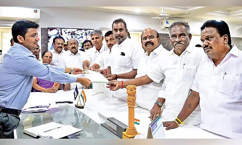 AIADMK MLAs led by SP Velumani submitting a petition to Collector Kranthi Kumar Pati in Coimbatore on Monday&nbsp;
