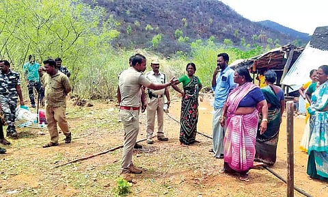 Forest officials arguing with residents during an eviction drive in Hogenakkal on Friday