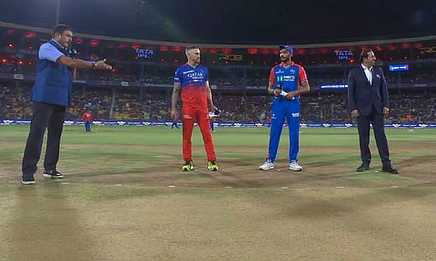 Faf du Plessis and Axar Patel during the toss (Screengrab)