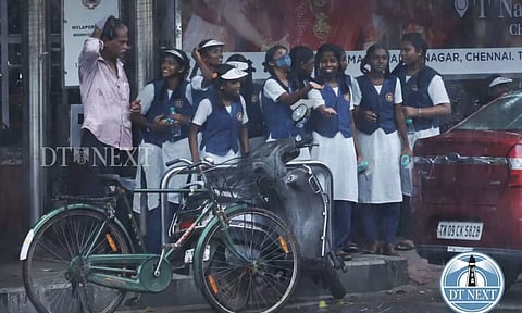 Students enjoying rain (Photo: Hemanathan)