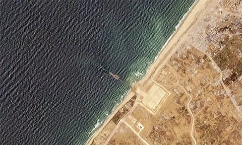 This satellite image from Planet Labs PBC shows a pier installed by the U.S. military in the Gaza Strip&nbsp;