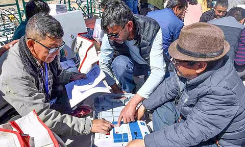 Polling officials collecting election material from a distribution centre fifth phase elections (PTI)
