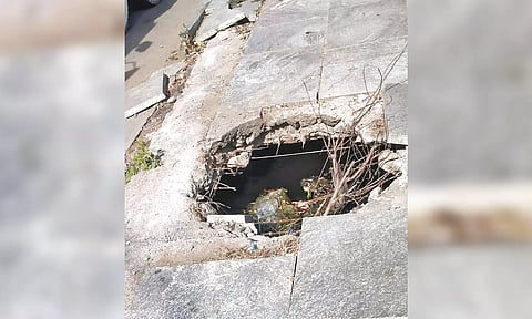 The damaged pathway on the road near Madhya Kailash