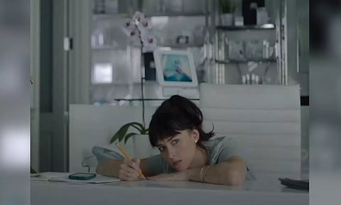 Dakota Johnson in a still from 'Am I OK?' trailer (Image source: YouTube)