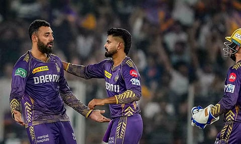 Varun Chakravarthy celebrates after a wicket (PTI)