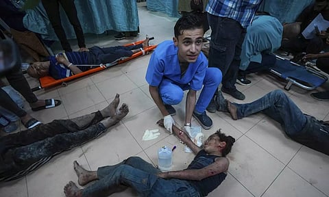 Palestinians wounded in the Israeli bombardment of the Gaza Strip(AP)