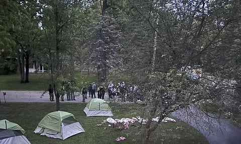 Pro-Palestinian protesters in Okemos, demonstrating outside the home of Hubbard (AP)