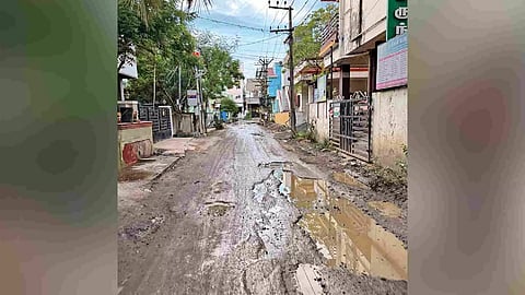 Damaged road seeking attention in Madipakkam