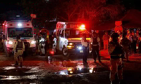 Soldiers stand near ambulances after a gust of wind caused a structure to collapse, resulting in multiple fatalities and injuries, at a campaign event for the Citizens' Movement party, in San Pedro Garza Garcia, Nuevo Leon, Mexico.(Image Credit: Reuters)&nbsp;