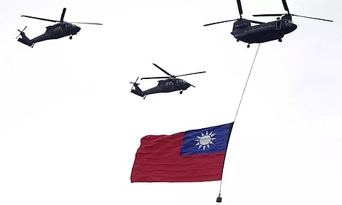 Taiwan’s President said on Thursday he would “stand on the front line” with soldiers (AP)