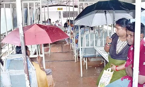 &nbsp;Commuters kept their umbrellas open inside the bus in Nagercoil&nbsp;