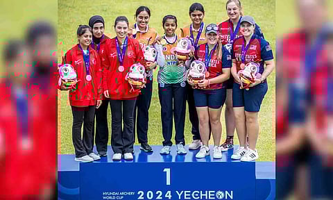The Indian trio of Jyothi Surekha Vennam, Parneet Kaur and Aditi Swami pose with their medals atop the podium (Photo:X)
