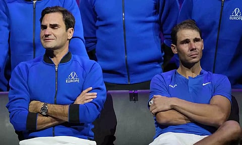 Roger Federer alongside Rafael Nadal (AP)