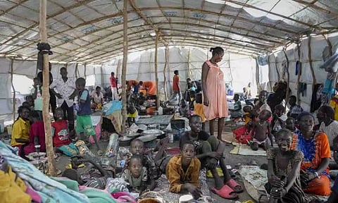 Aid group says over 100 people killed in 2 weeks of fighting in a Sudanese city (AP)