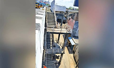 Staircase built for pedestrians has become reduntant as they prefer to cross the road under the flyover