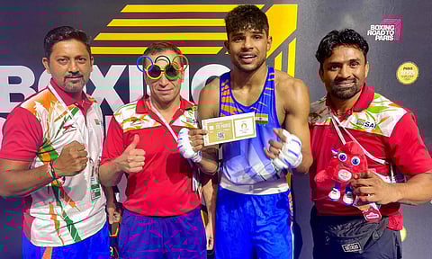 Nishant Dev with his ticket to Paris after his win on Friday