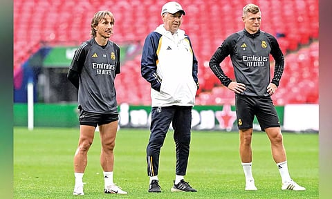 Luka Modric, Carlo Ancelotti, Toni Kroos during a training session ahead of final