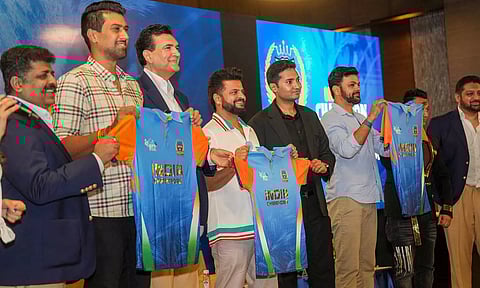 Former cricketers Suresh Raina and R.P. Singh with other dignitaries during the unveiling ceremony of the team and jersey of India Champions for the upcoming World Championship of Legends (WCL) cricket tournament, in New Delhi (PTI)