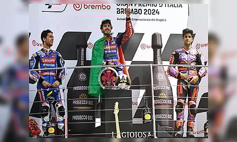 Ducati Lenovo Team's Francesco Bagnaia (In Centre) at podium after winning Italian MotoGP (ANI)