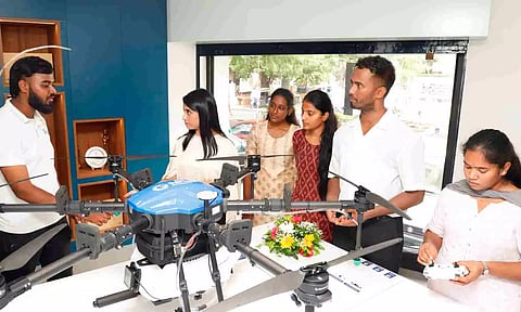 Customers enquiring about the drone in Garuda Aerospace Chennai Showroom