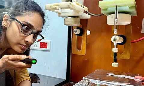 A picture from the IIT-M experiment of water droplets breaking natural minerals to form nanoparticles